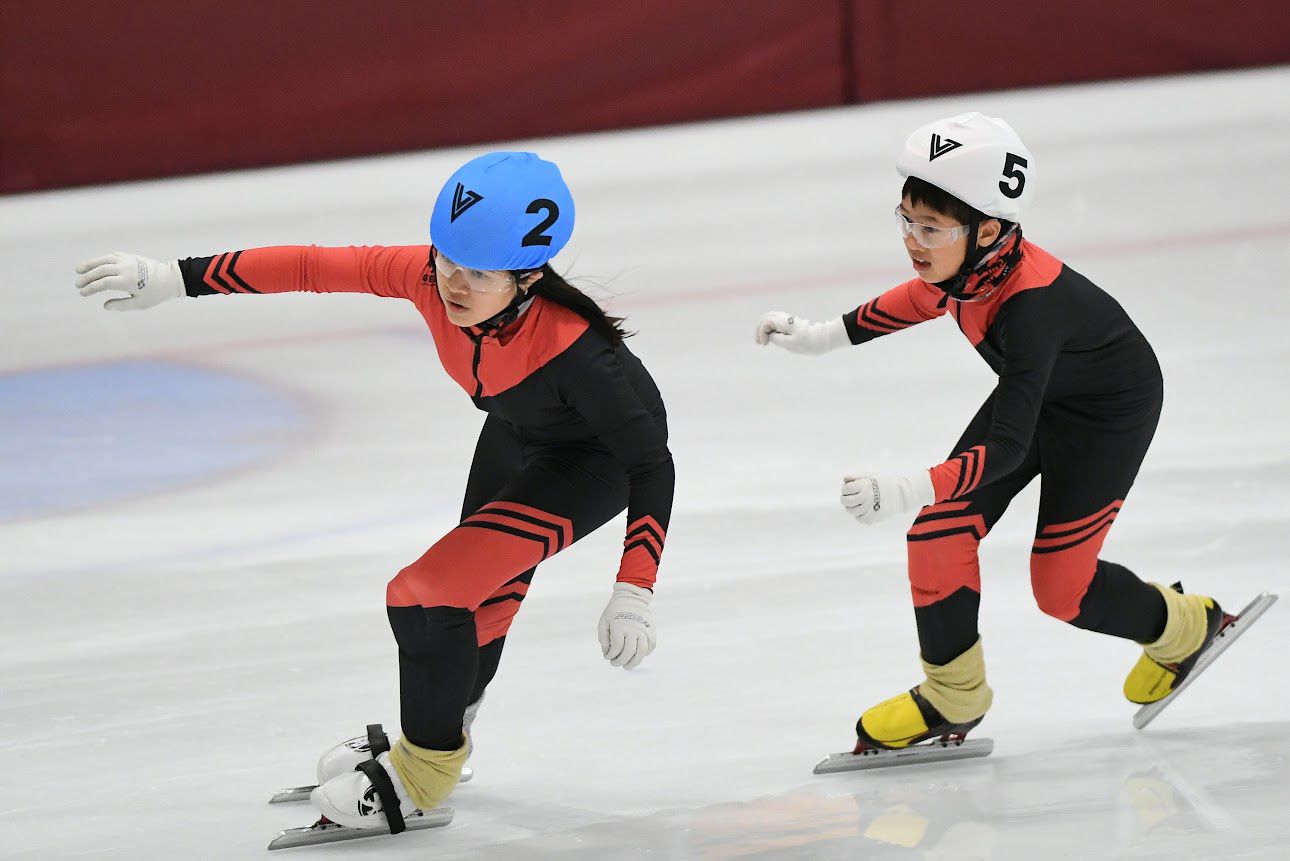 Two Burnaby skaters racing